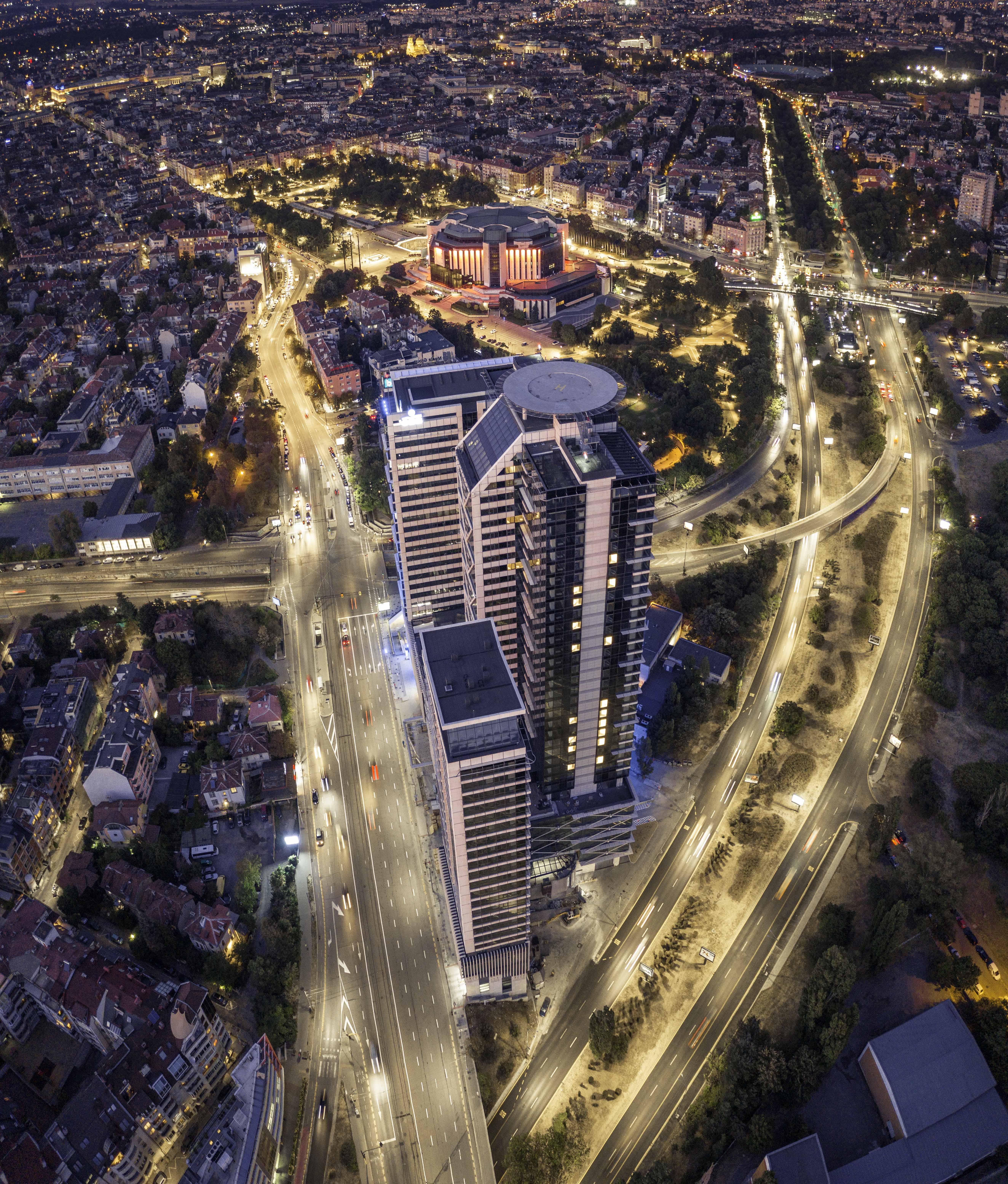 Grand Hotel Millennium Sófia Exterior foto Aerial view of the complex at night